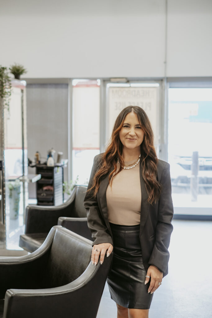 Danielle Cherewyk standing in her Grande Prairie hair salon The Headroom